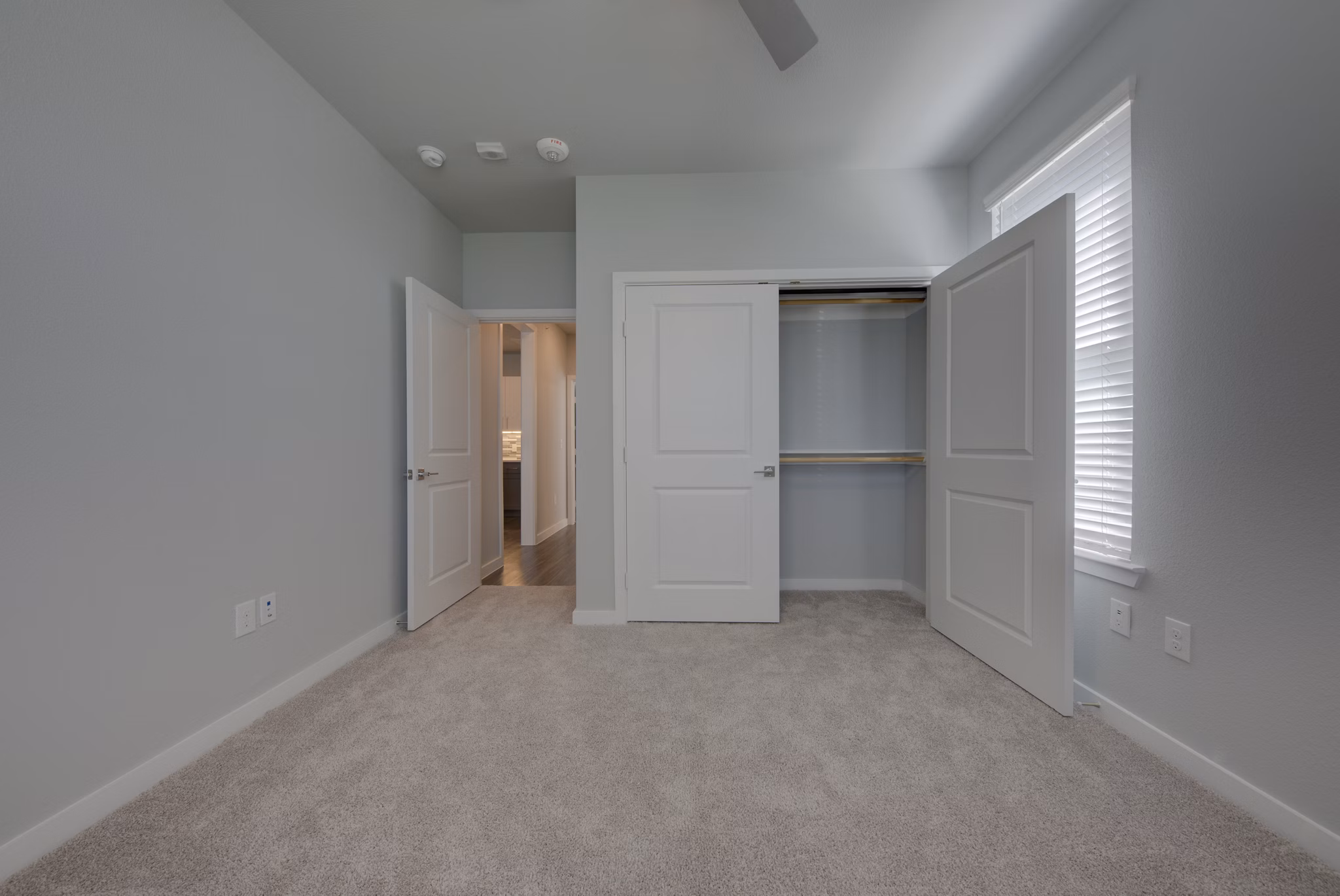 Modern bedroom with stylish decor at Tacara Westpointe Village Apartments