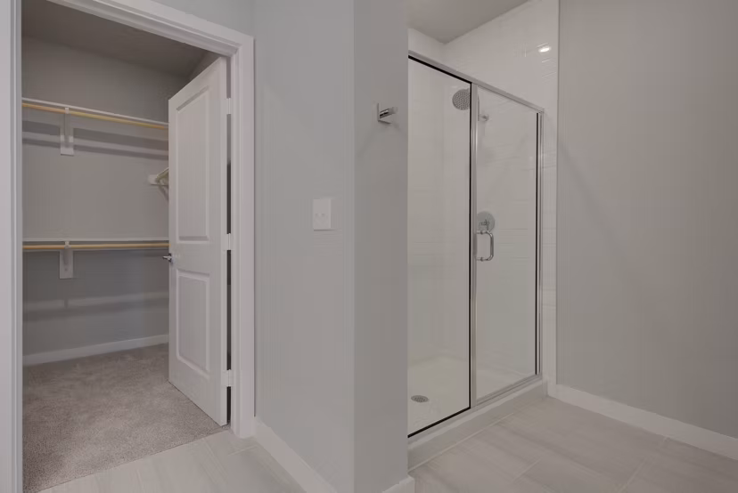 Bedroom featuring modern design and stylish decor in Tacara Westpointe Village Apartments
