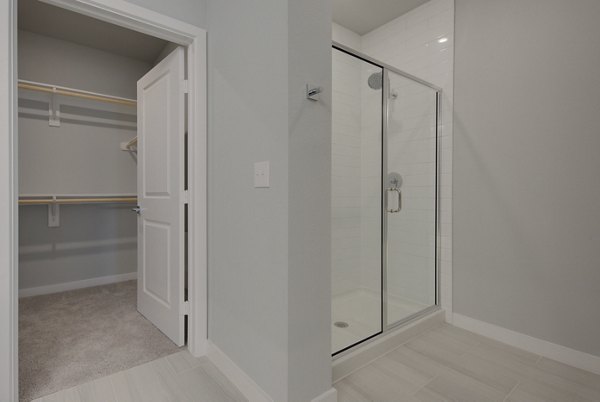 Bedroom featuring modern design and stylish decor in Tacara Westpointe Village Apartments