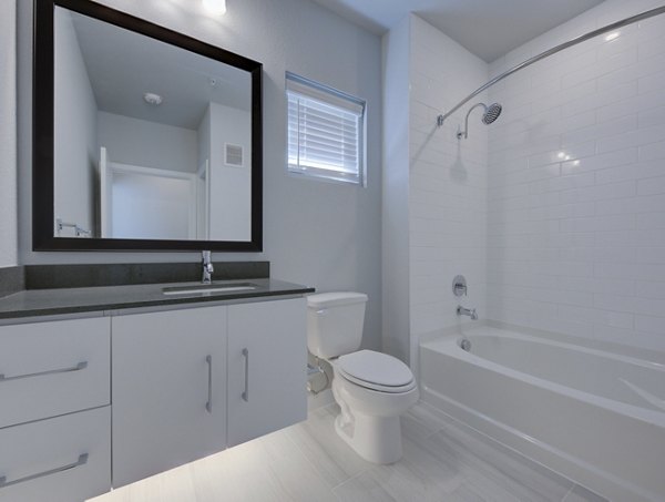 Modern bathroom with sleek fixtures at Tacara Westpointe Village Apartments