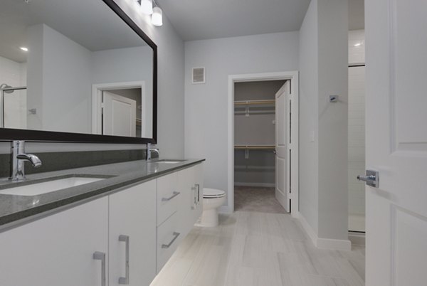 Bathroom featuring modern fixtures and sleek design in Tacara Westpointe Village Apartments