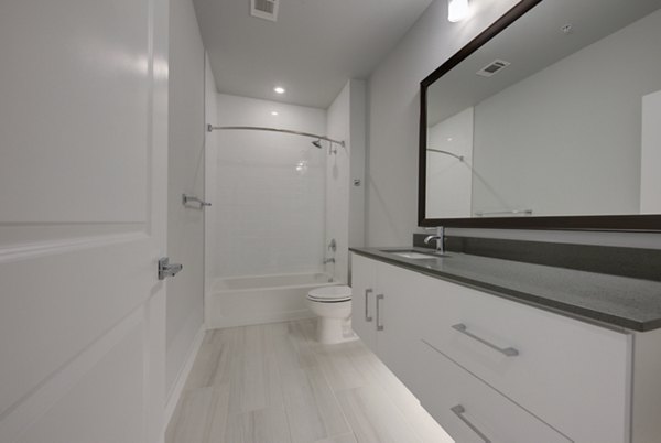 Modern bathroom featuring sleek finishes at Tacara Westpointe Village Apartments