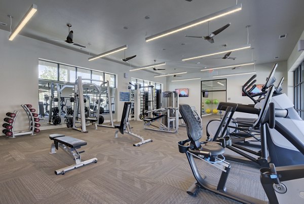 State-of-the-art fitness center featuring modern equipment at Tacara Westpointe Village Apartments