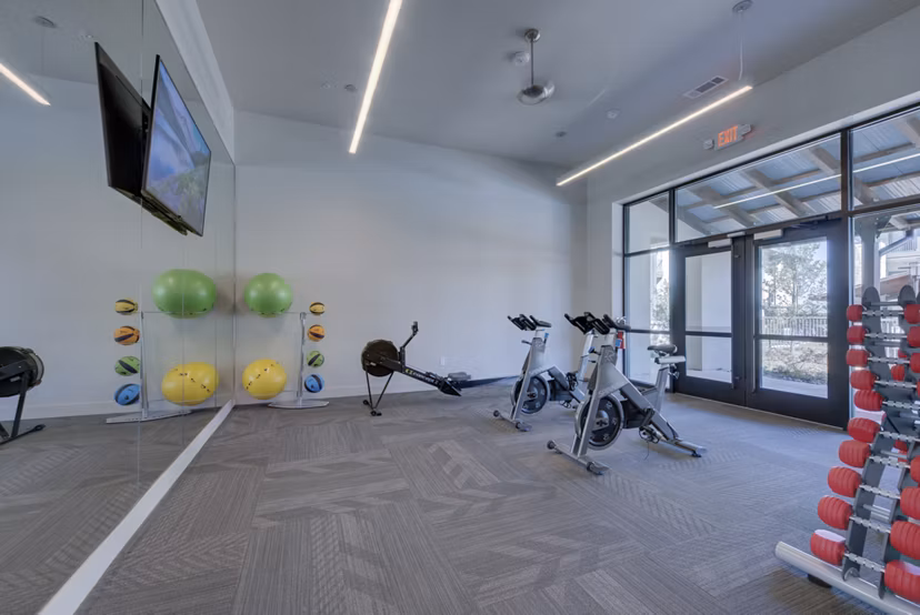 Fitness center with modern equipment at Tacara Westpointe Village Apartments