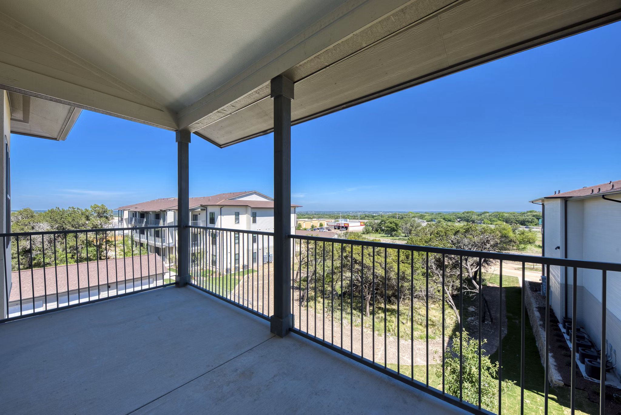 Patio area featuring modern outdoor seating at Tacara Westpointe Village Apartments
