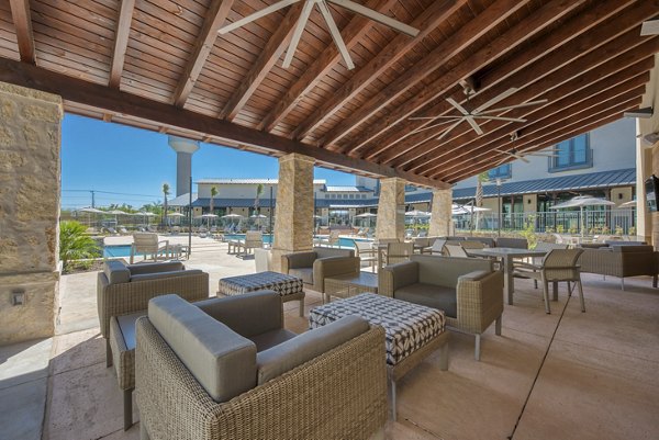 Cozy outdoor patio with seating at Tacara Westpointe Village Apartments in Texas Hill Country