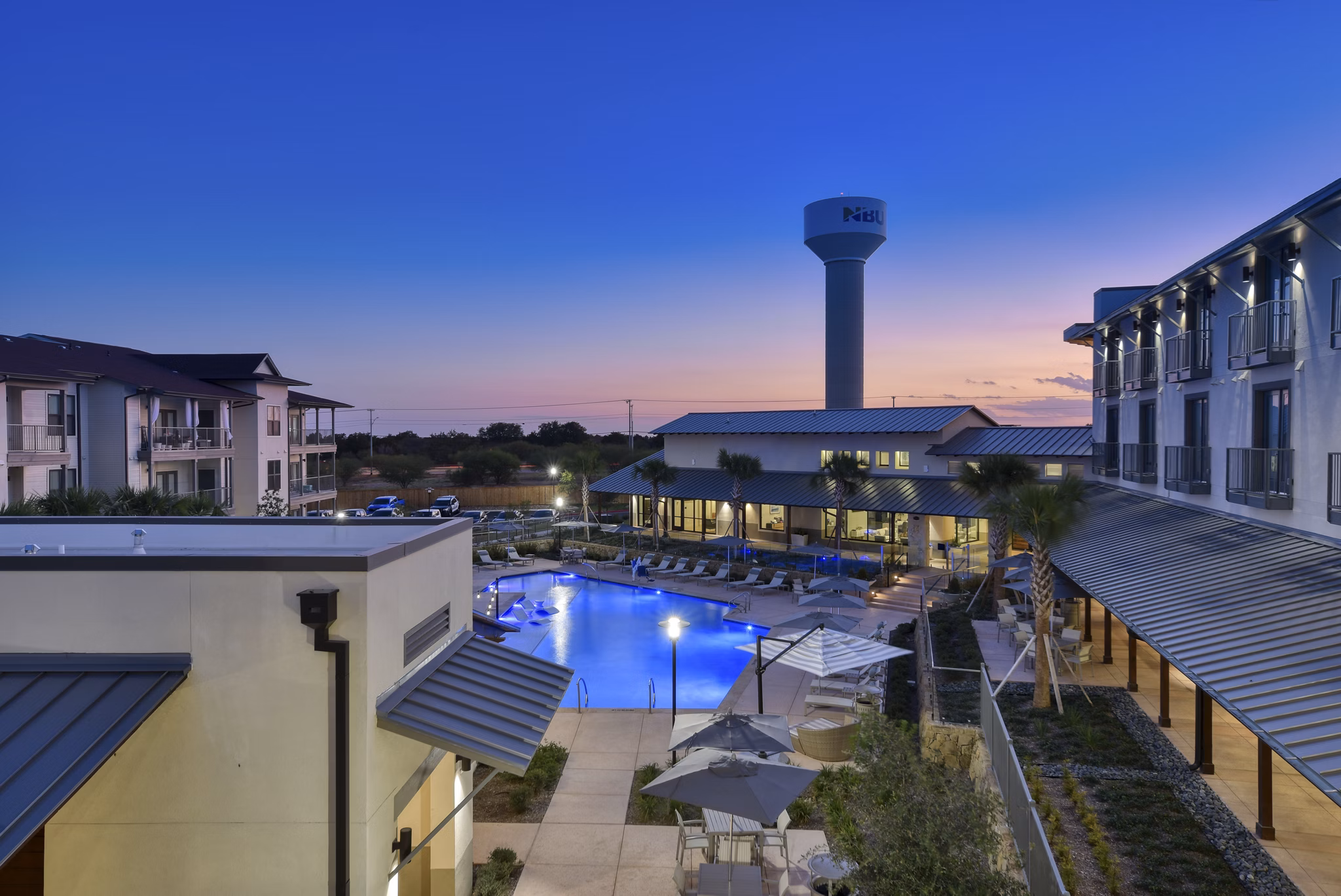 Tacara Westpointe Village Apartments: Luxury view showcasing modern design in lush Texas Hill Country setting