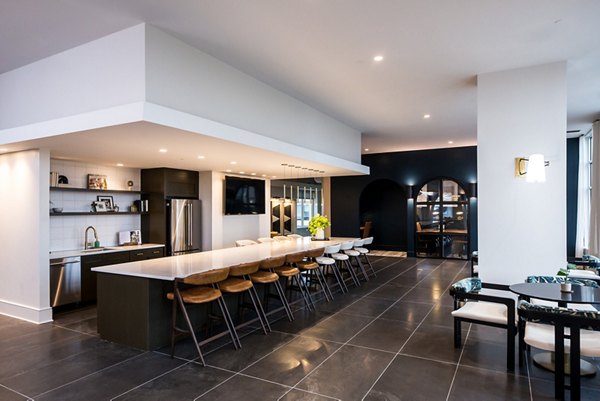 Clubhouse with modern design and cozy seating at The Residence at SouthPark Apartments, a luxury Greystar property in a vibrant community
