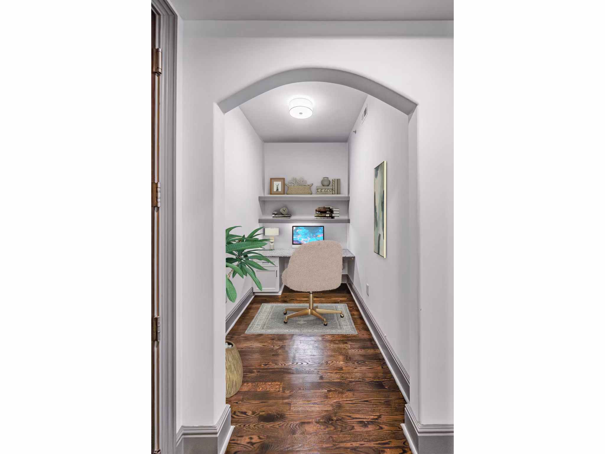 Home office with ergonomic desk and chair at The Residence at SouthPark Apartments
