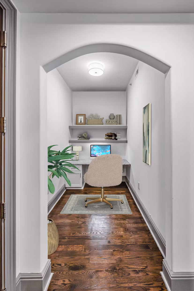 Home office with ergonomic desk and chair at The Residence at SouthPark Apartments
