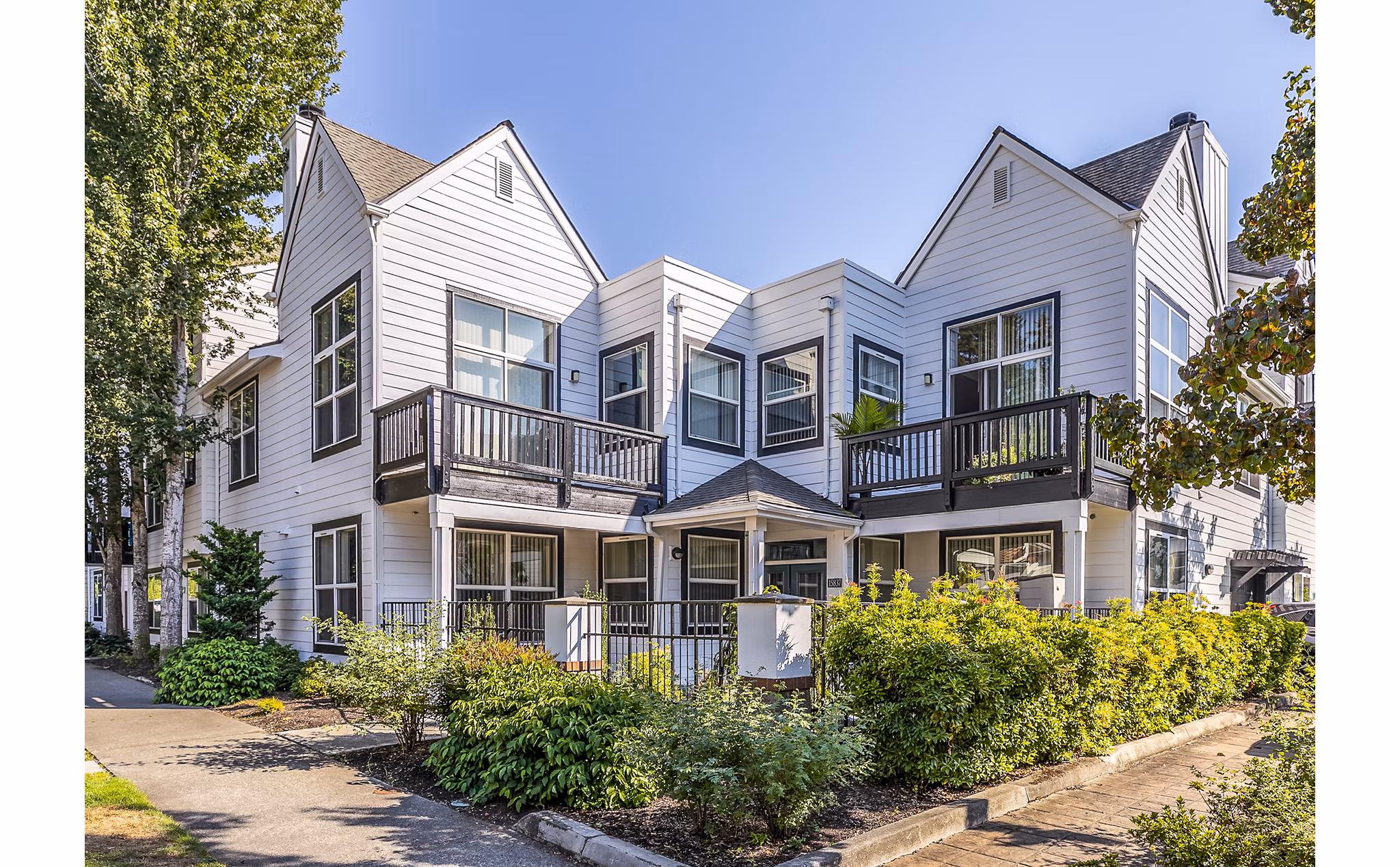 Avignon Townhomes: Elegant townhome exteriors in a serene setting