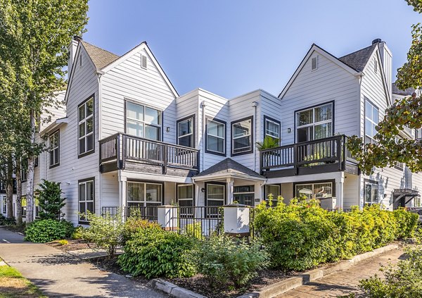 Avignon Townhomes: Elegant townhome exteriors in a serene setting