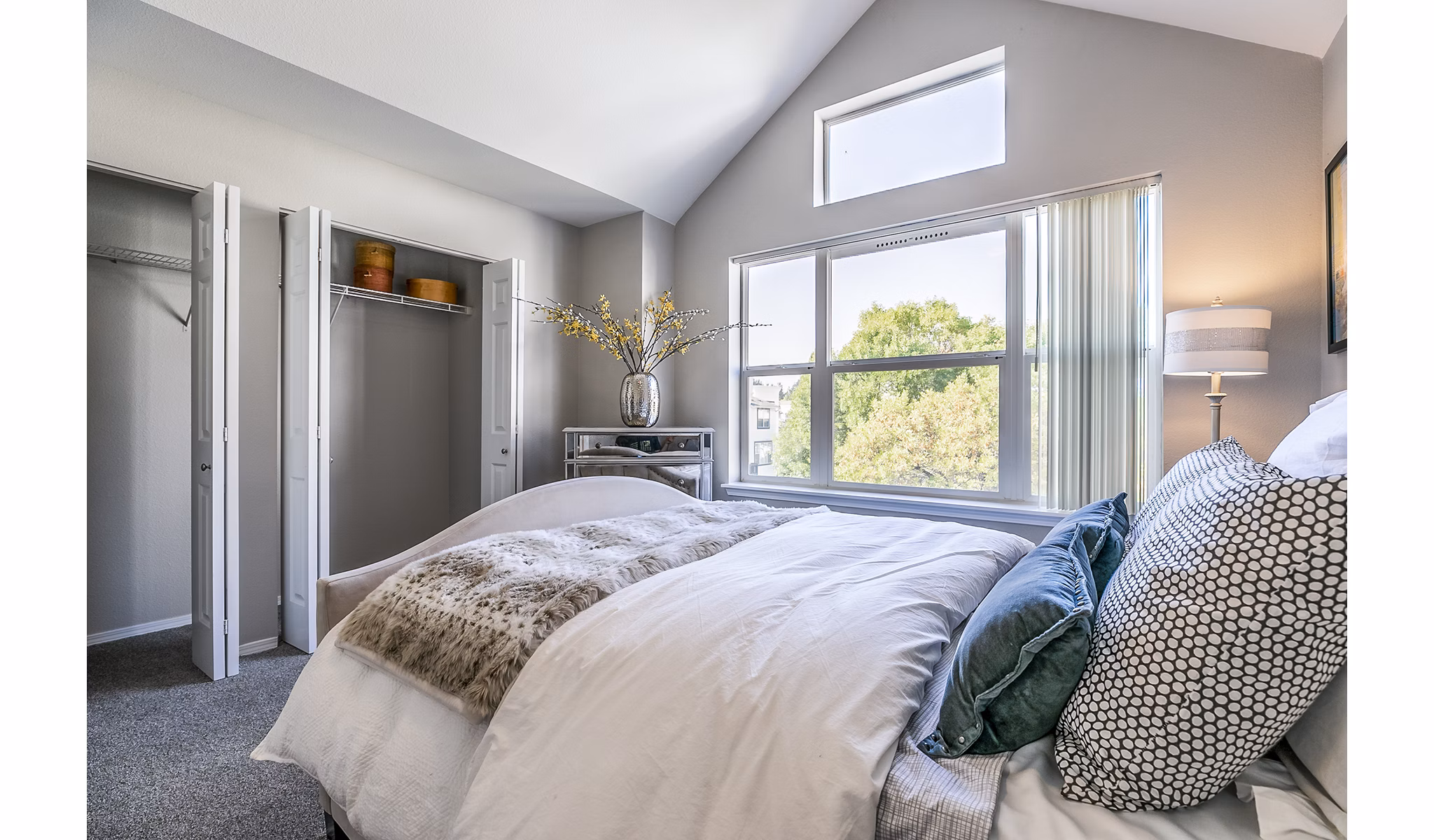 Modern bedroom with natural light at Avignon Townhomes Apartments