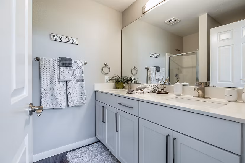 Luxurious bathroom featuring modern fixtures at Avignon Townhomes Apartments
