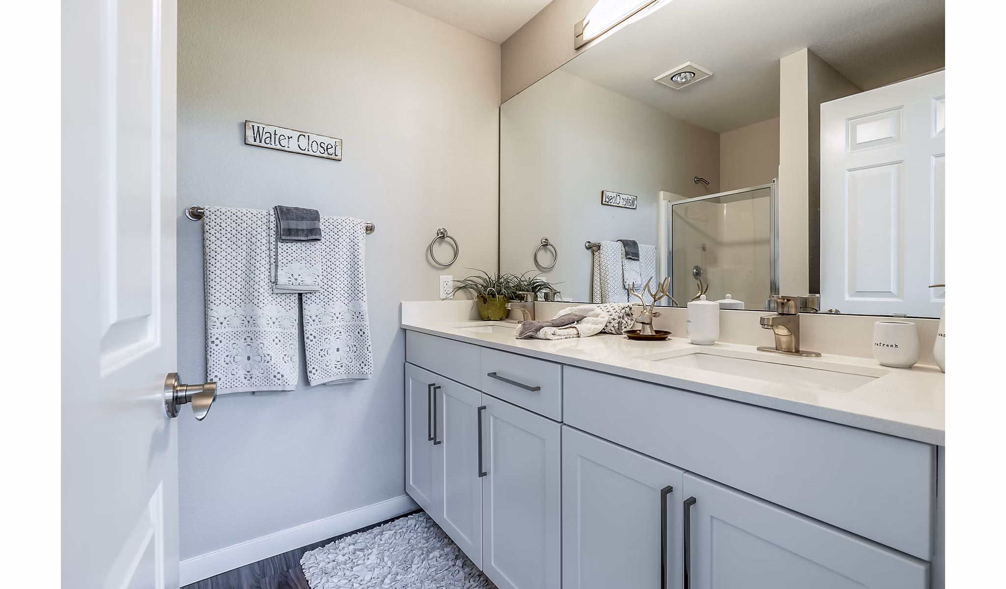Luxurious bathroom featuring modern fixtures at Avignon Townhomes Apartments