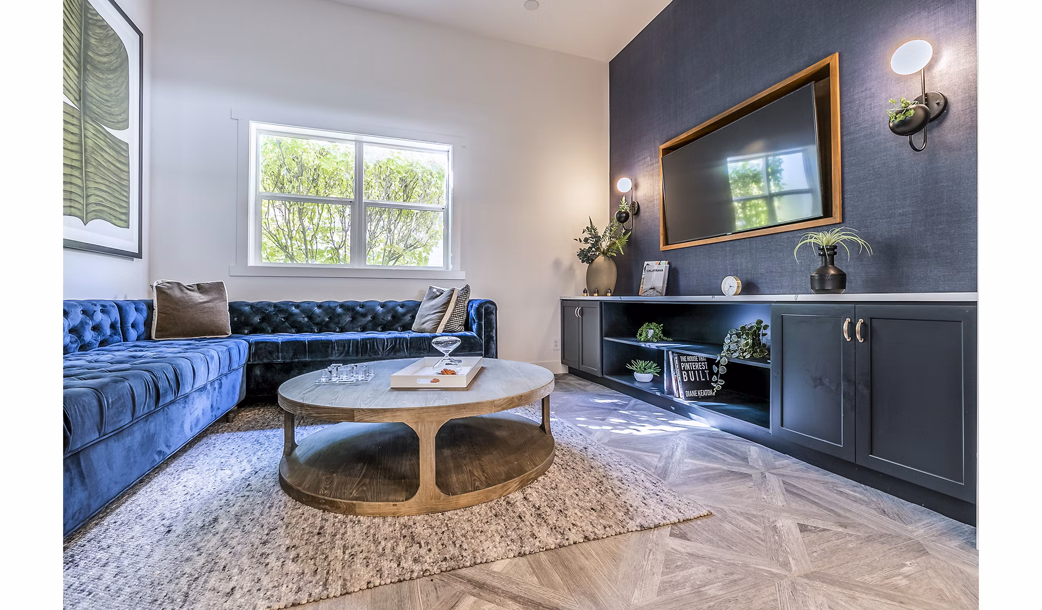 Cozy clubhouse theater with plush seating at Avignon Townhomes Apartments, ideal for private screenings and community events