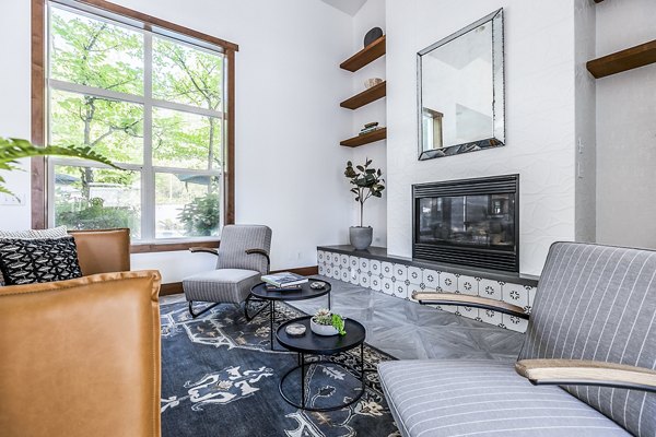 Clubhouse lobby with modern seating and elegant lighting in Avignon Townhomes Apartments