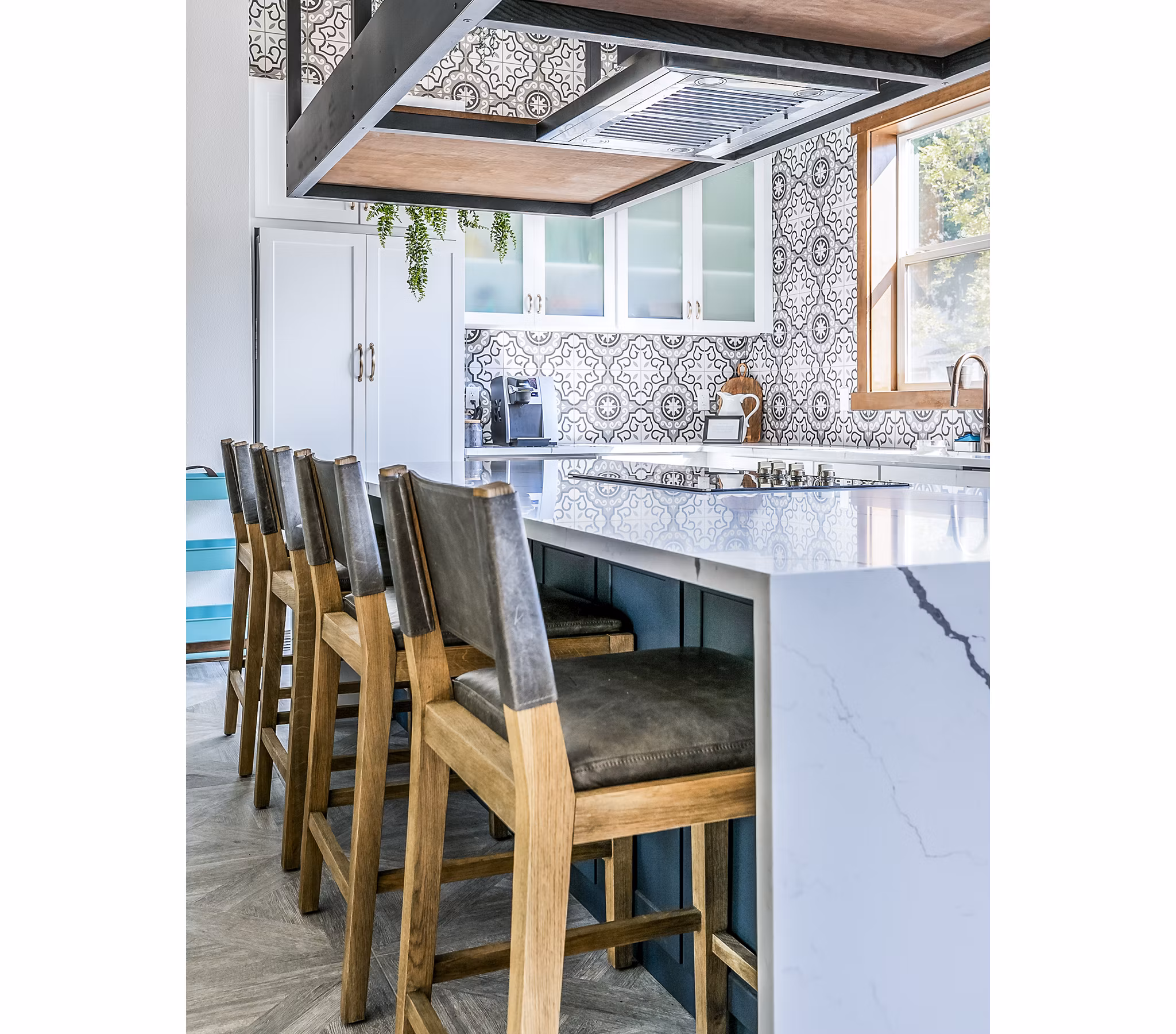 Clubhouse kitchen and bar with modern appliances at Avignon Townhomes Apartments, offering a luxury community space for residents
