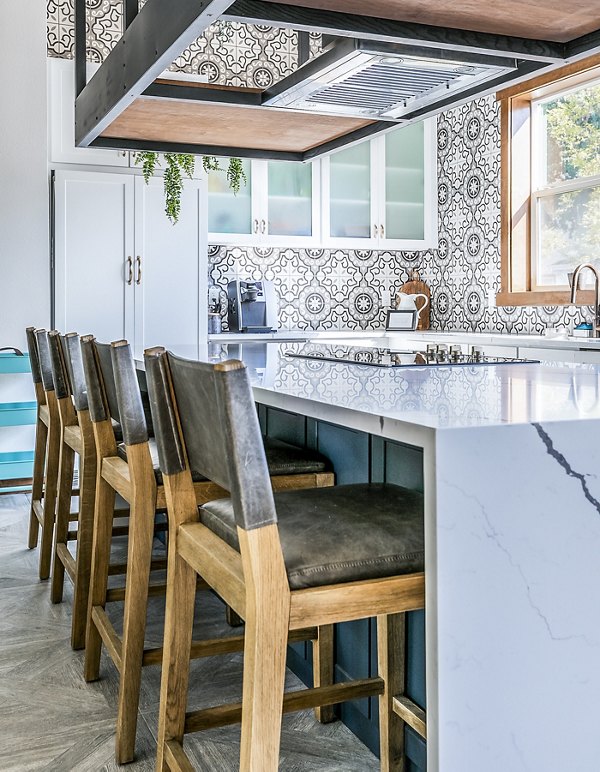 Clubhouse kitchen and bar with modern appliances at Avignon Townhomes Apartments, offering a luxury community space for residents