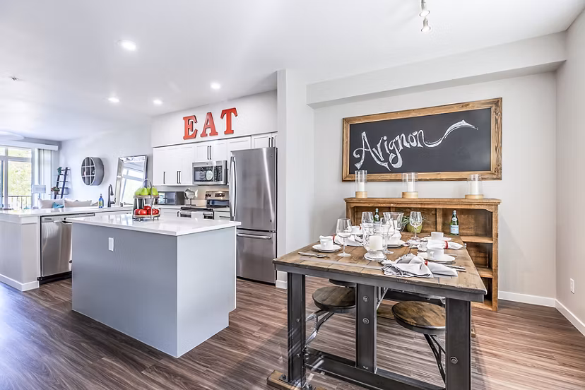 Dining room featuring elegant decor and modern furnishings at Avignon Townhomes Apartments
