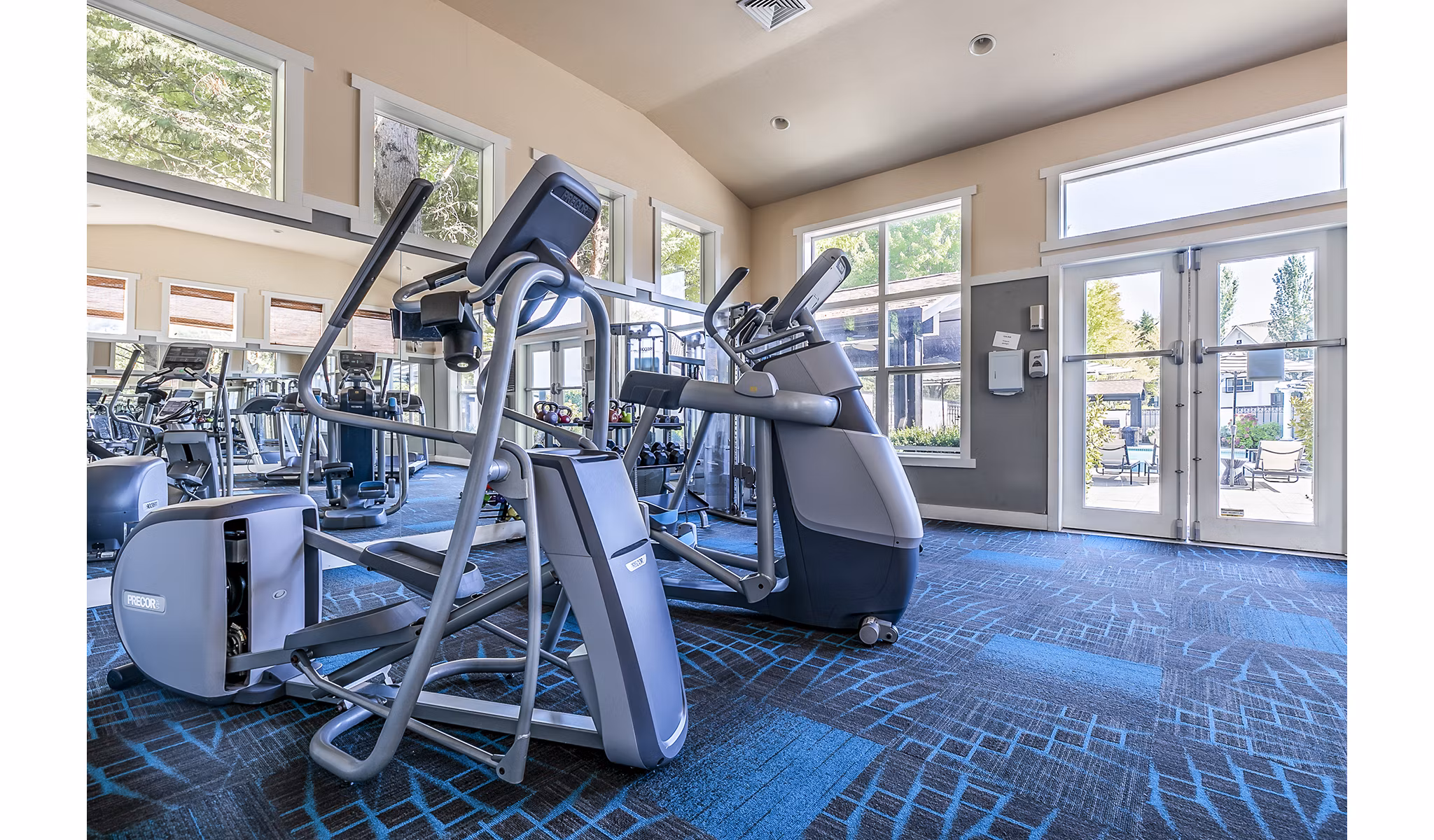 Modern fitness center with state-of-the-art equipment at Avignon Townhomes Apartments