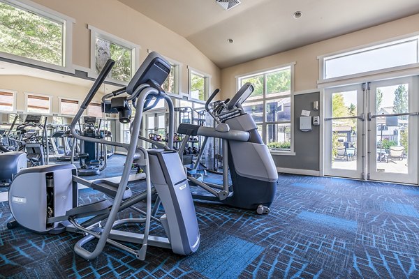 Modern fitness center with state-of-the-art equipment at Avignon Townhomes Apartments