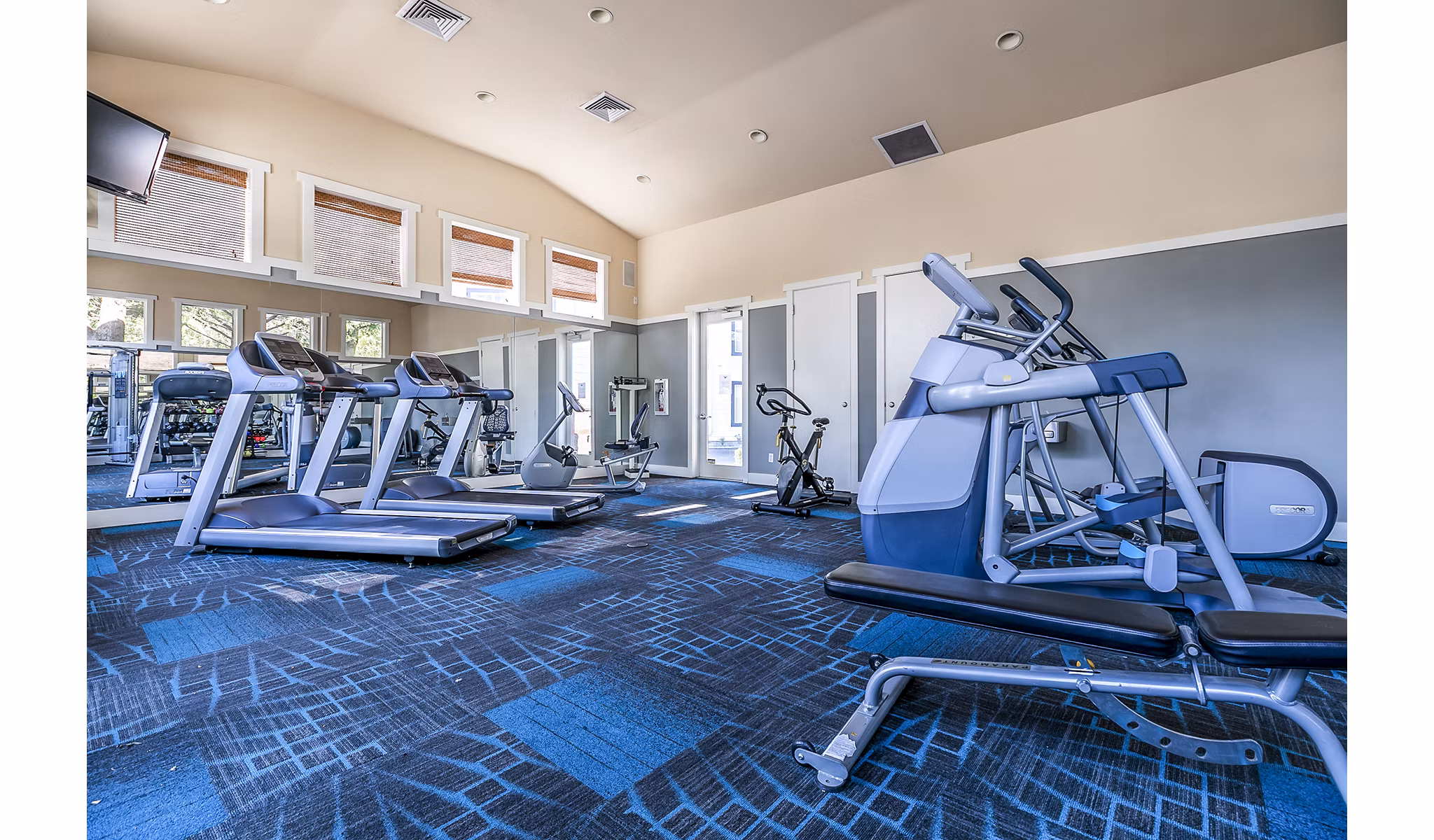 Fitness center with state-of-the-art equipment at Avignon Townhomes Apartments offering luxury amenities for active lifestyles