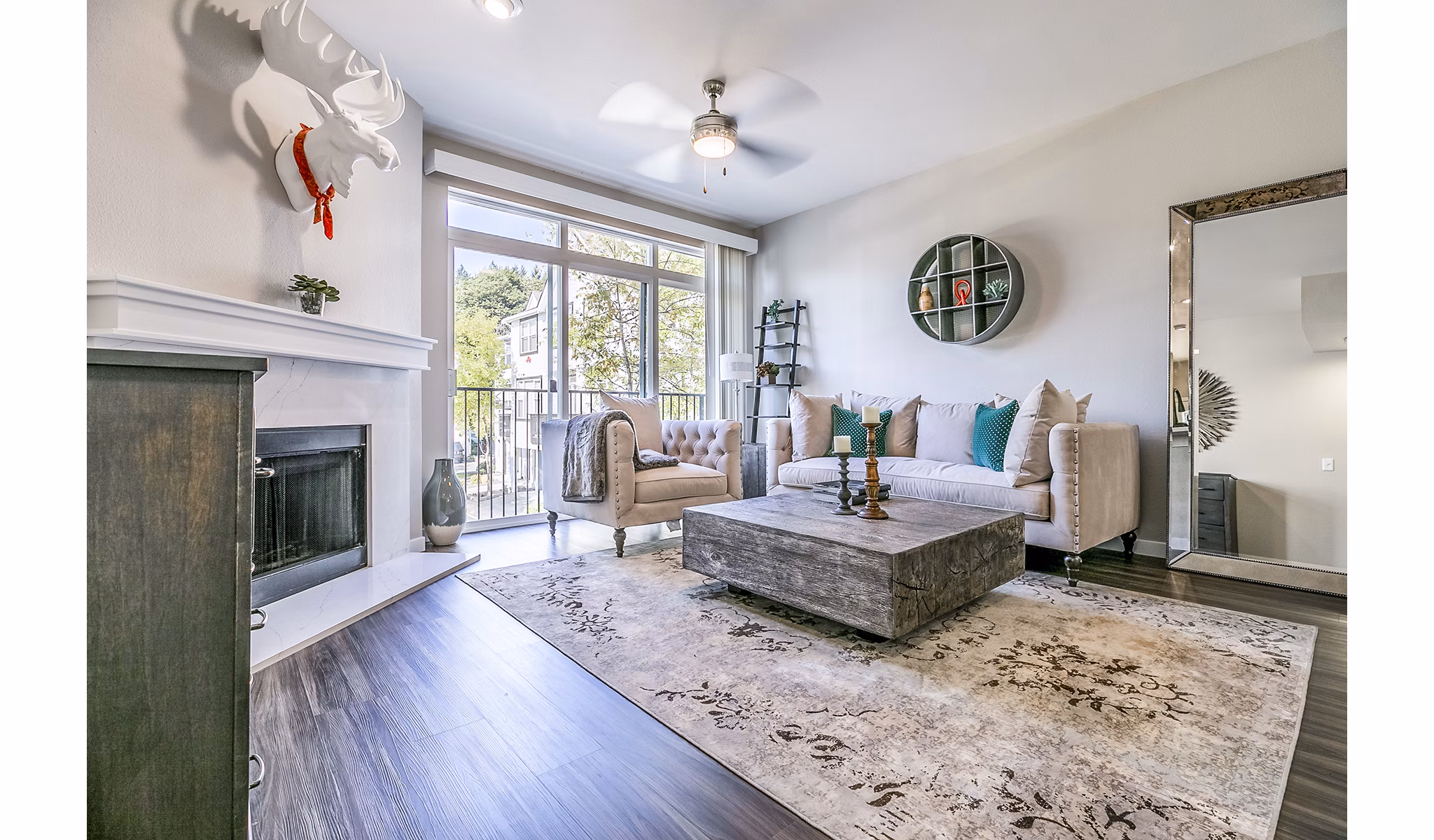 Airy living room with modern decor and plush seating at Avignon Townhomes Apartments, offering a luxury living experience