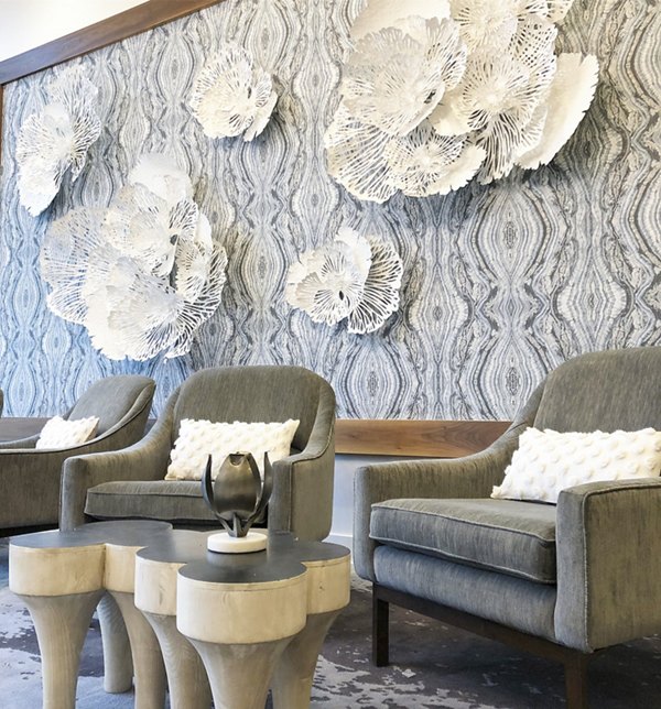Clubhouse at Savoy Apartments: Modern communal space with lush seating and high-speed Wi-Fi for luxury living