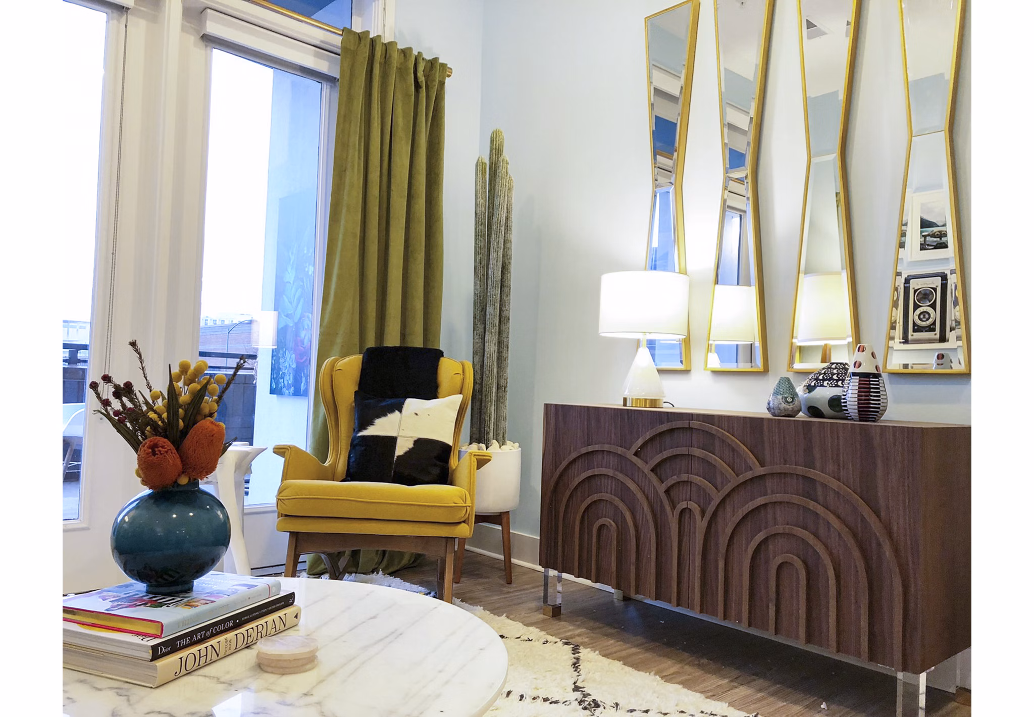 Spacious living room with modern furnishings in Savoy Apartments
