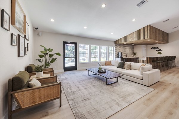 Elegant clubhouse featuring modern decor and seating at Sage at Green Valley Apartments