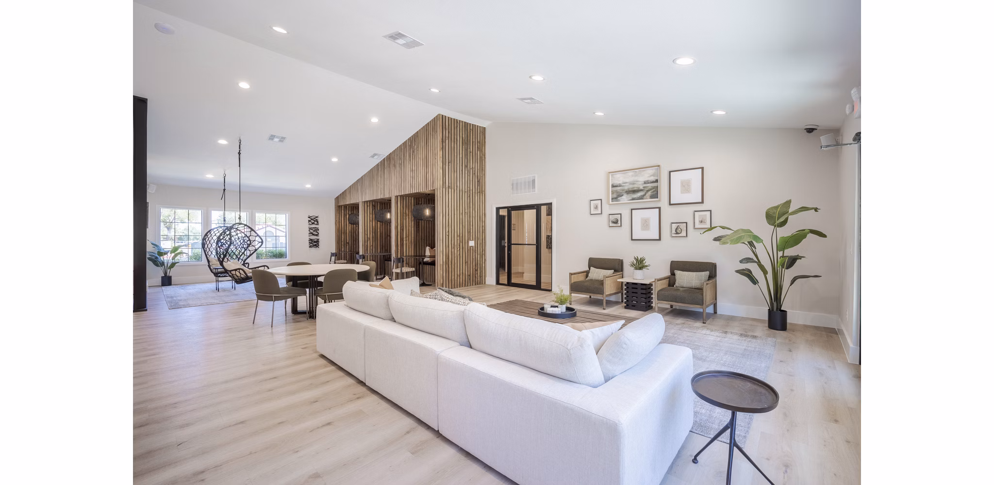 Luxury clubhouse with modern design at Sage at Green Valley Apartments, offering premium amenities and comfortable lounging spaces