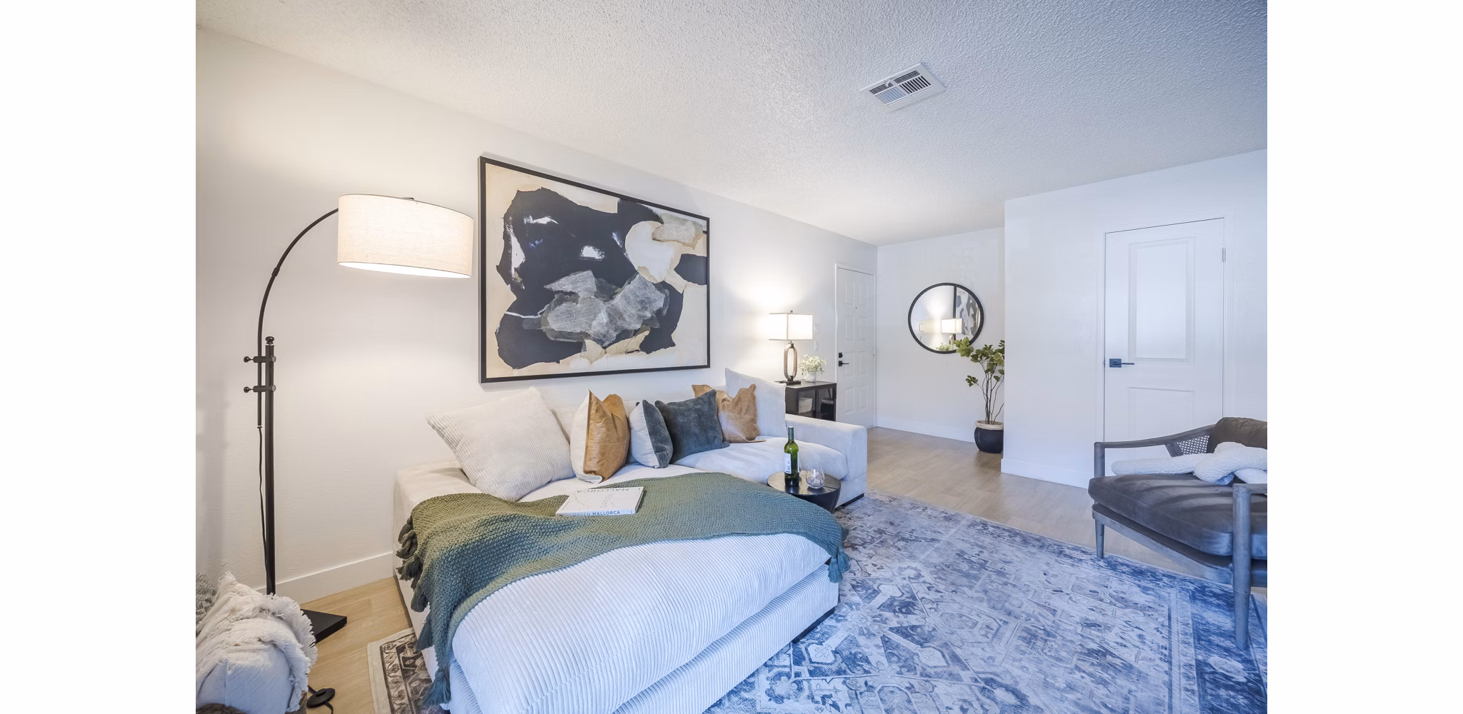 Modern living room with stylish decor in Sage at Green Valley Apartments, offering luxury comfort and spacious design ideal for relaxation