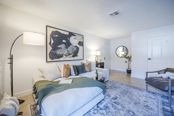 Modern living room with stylish decor in Sage at Green Valley Apartments, offering luxury comfort and spacious design ideal for relaxation