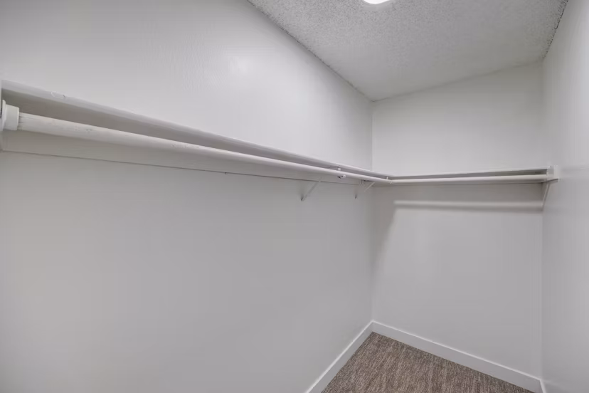 Closet with ample storage space at 5400 Vistas Apartments