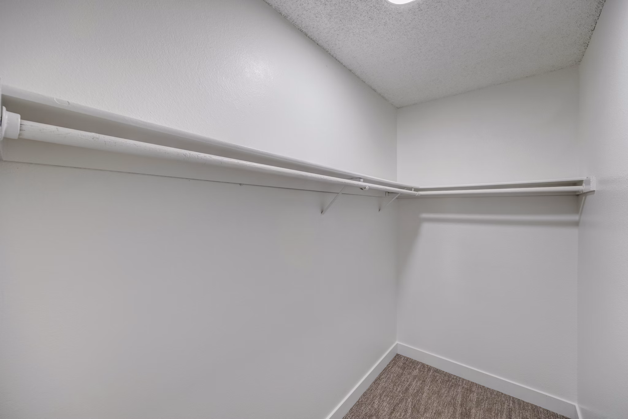 Closet with ample storage space at 5400 Vistas Apartments