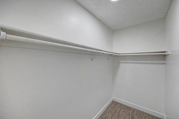 Closet with ample storage space at 5400 Vistas Apartments