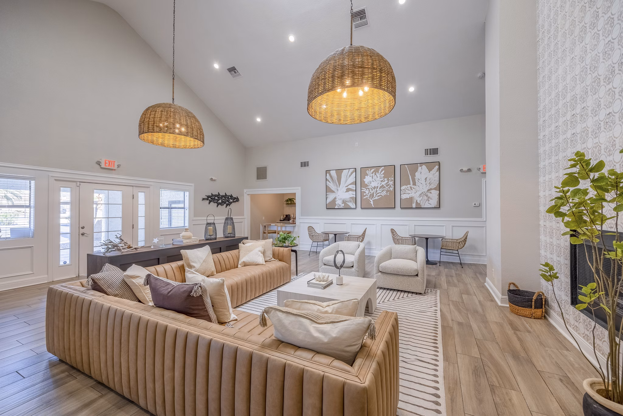 Clubhouse with modern seating and billiards table at 5400 Vistas Apartments, a Greystar luxury community