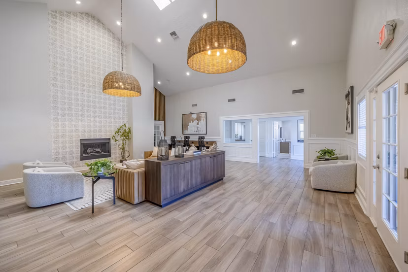 Modern clubhouse with billiards and lounge area at 5400 Vistas Apartments