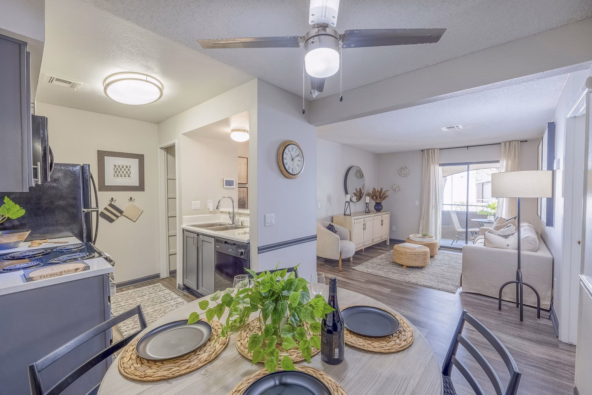 Dining area featuring modern furnishings and chic lighting at 5400 Vistas Apartments