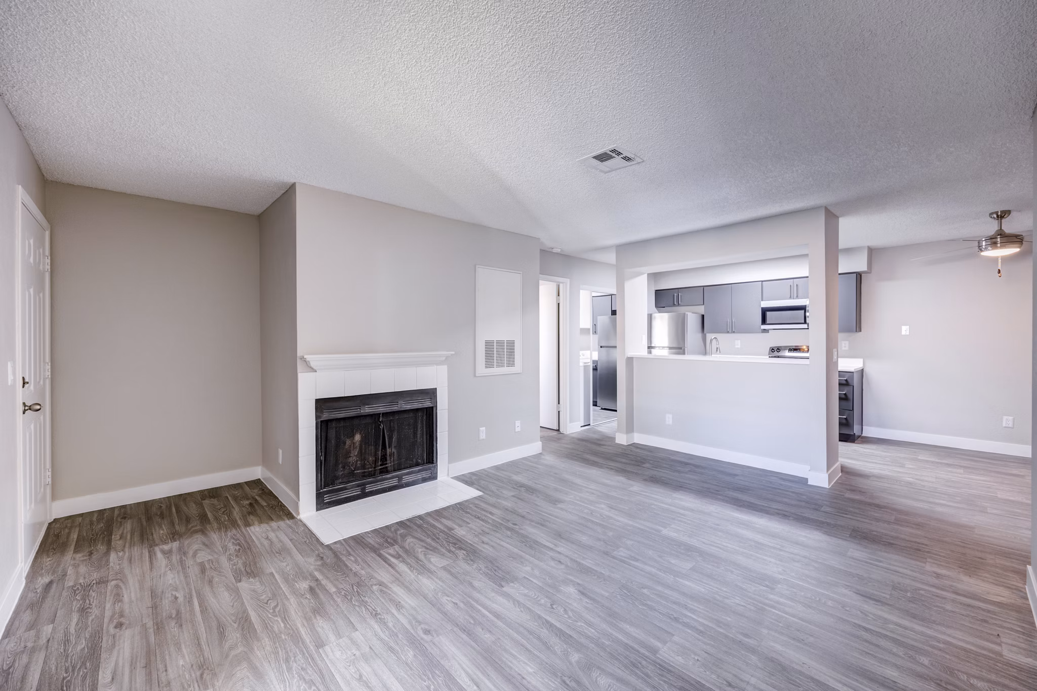 Inviting living room with modern decor at 5400 Vistas Apartments