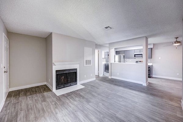 Inviting living room with modern decor at 5400 Vistas Apartments
