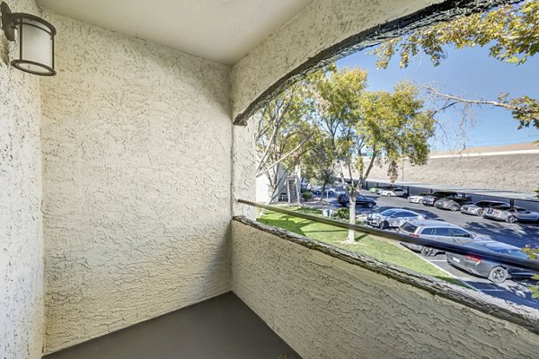 Cozy outdoor patio with seating at 5400 Vistas Apartments, perfect for relaxation and social gatherings