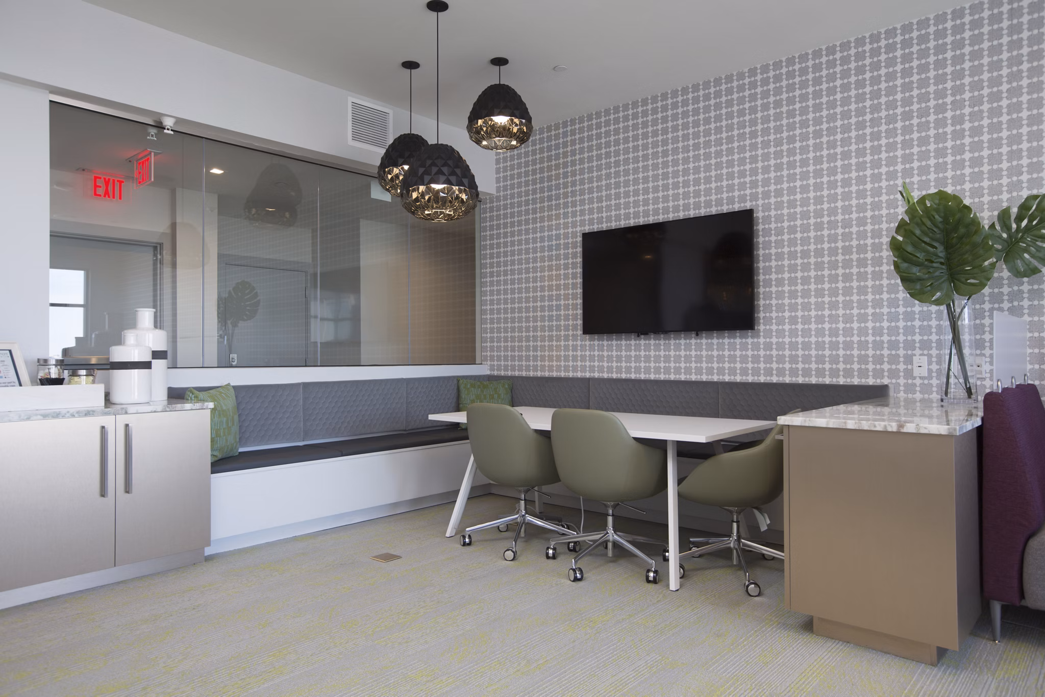 Clubhouse featuring luxurious seating and modern design in One Beachmont Apartments