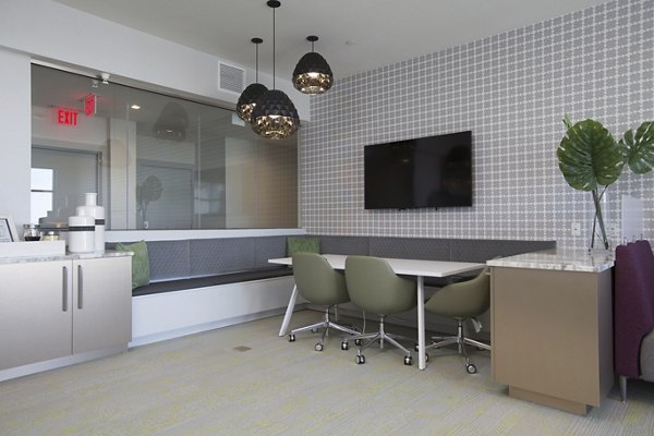 Clubhouse featuring luxurious seating and modern design in One Beachmont Apartments