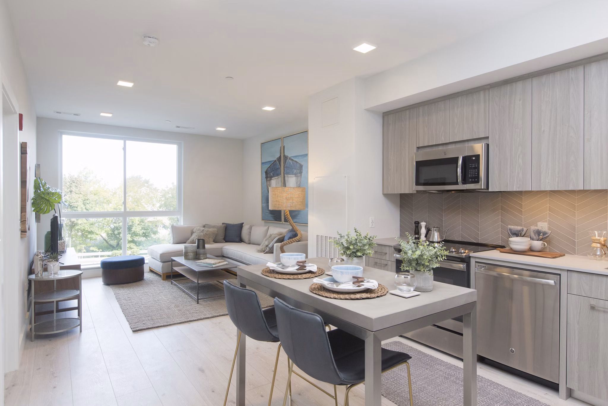 Elegant dining area with modern furnishings at One Beachmont Apartments