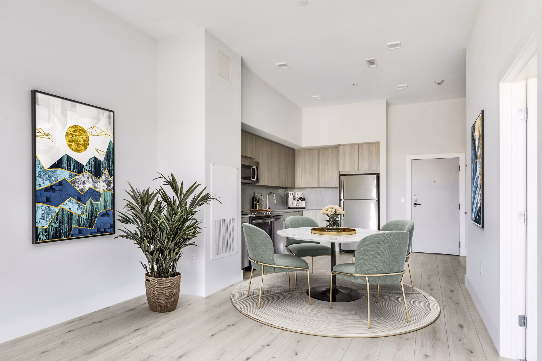 Dining room featuring elegant decor and modern furnishings at One Beachmont Apartments