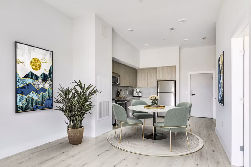 Dining room featuring elegant decor and modern furnishings at One Beachmont Apartments