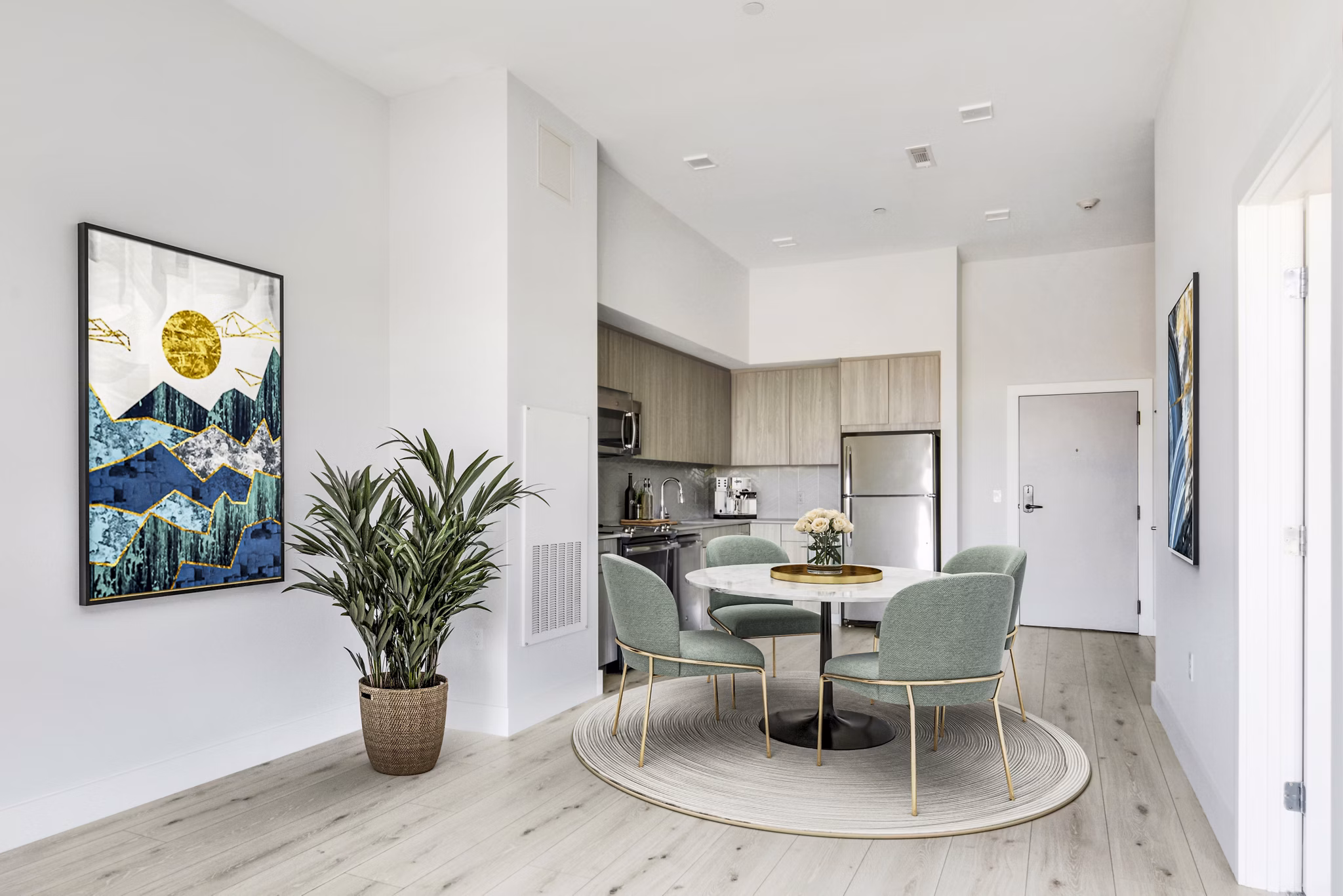 Dining room featuring elegant decor and modern furnishings at One Beachmont Apartments
