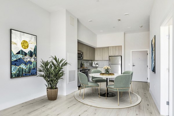 Dining room featuring elegant decor and modern furnishings at One Beachmont Apartments